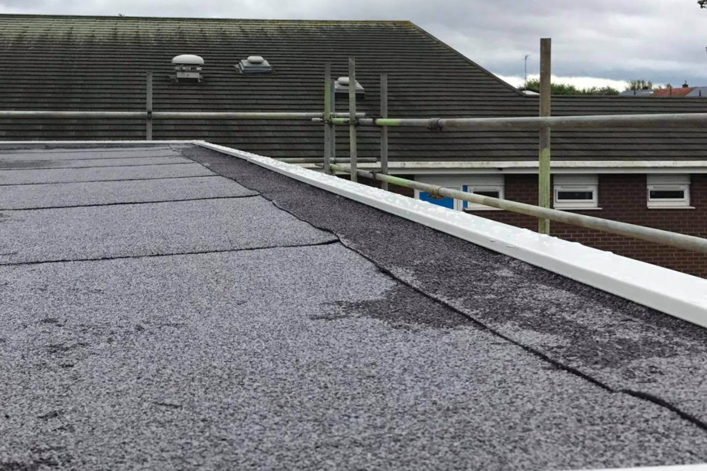 school building contractors flat roof repair - Greater Manchester